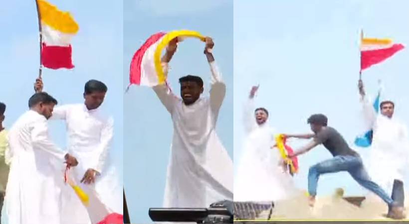 പുലിമുട്ടുകൾക്ക് മുകളിൽ കയറി പതാക നാട്ടി വൈദികർ; വിഴിഞ്ഞത്ത് ഇന്നും പ്രതിഷേധം
